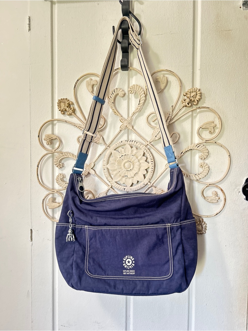 Kipling Navy and Cream Shoulder Bag with Striped Strap